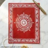 Minimal handmade Aipan mandala art painting in red and white on canvas cloth featuring traditional Indian folk design