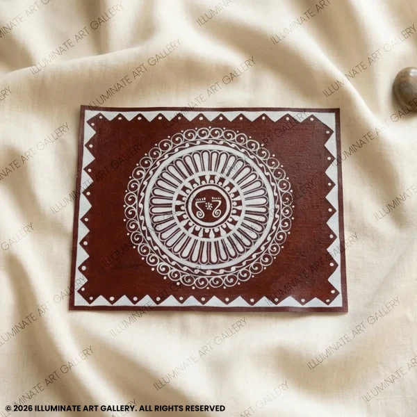 Handmade Aipan mandala artwork on red background featuring traditional Kumaoni folk design with intricate white patterns on canvas cloth